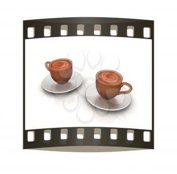 Coffee cups on saucer on a white background. The film strip