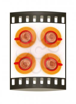 Coffee cups on saucer on a white background. The film strip