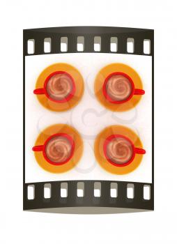 Coffee cups on saucer on a white background. The film strip