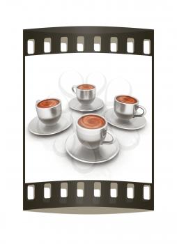 Coffee cups on saucer on a white background. The film strip