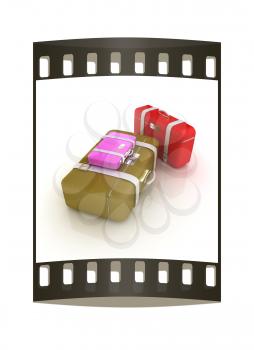 Traveler's suitcases. Family travel concept. The film strip