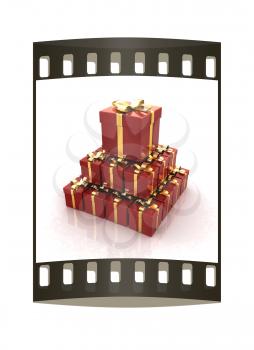 Bright christmas gifts on a white background. The film strip 