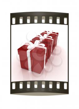 Bright christmas gifts on a white background. The film strip 