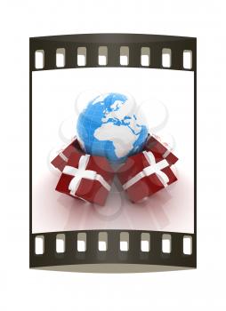 Traditional Christmas gifts and earth on a white background. Global holiday concept. The film strip