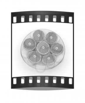 half oranges on a white background. The film strip