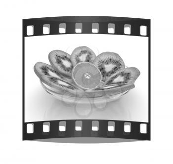 slices of kiwi and orange on a white background. The film strip