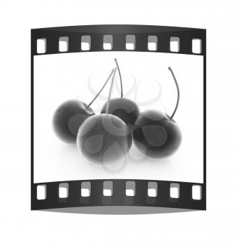 Sweet cherries on a white background. The film strip