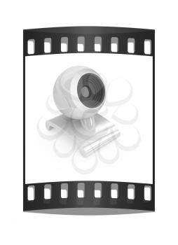 Web-cam on a white background. The film strip