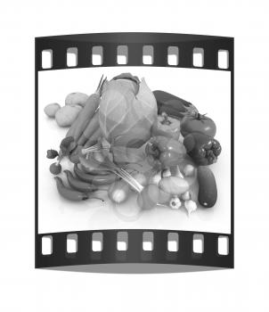 fresh vegetables with green leaves on a white background. The film strip