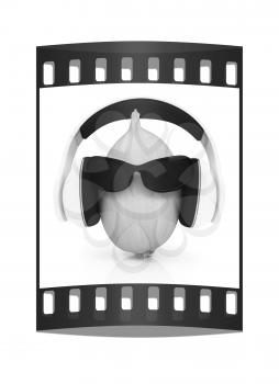 Ripe onion with sun glass and headphones front face on a white background. The film strip