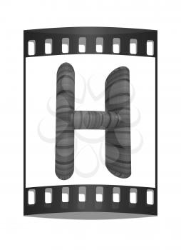 Wooden Alphabet. Letter H on a white background. The film strip