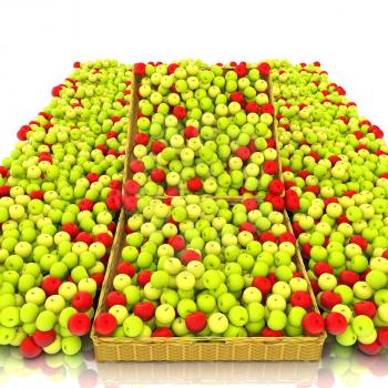 Wicker basket full of apples isolated on white