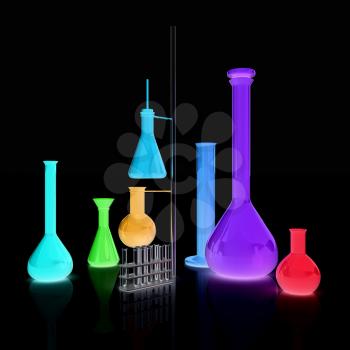 Chemistry set, with test tubes, and beakers filled with colored liquids