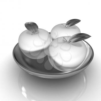 Metall apples on a plate