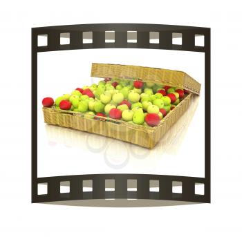 Wicker basket full of apples isolated on white