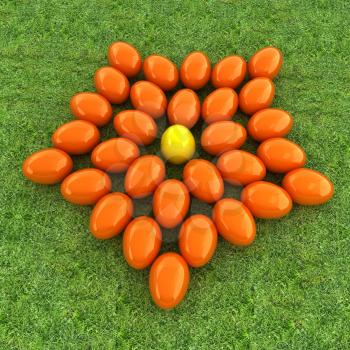 Colored Easter eggs as a flower on a green grass