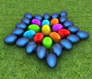 Colored Easter eggs as a flower on a green grass