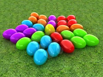 Colored Easter eggs as a flower on a green grass