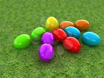 Colored Easter eggs as a flower on a green grass