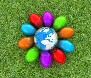 Colored Easter eggs around Earth on a green grass