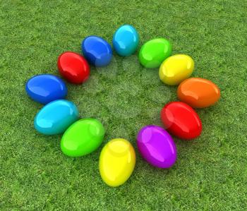 Colored Easter eggs on a green grass