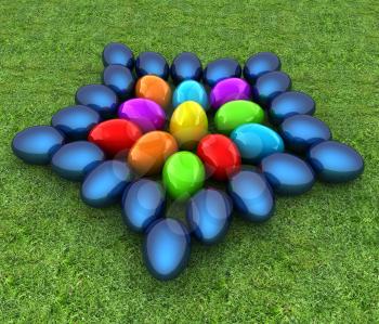 Colored Easter eggs as a flower on a green grass