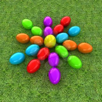 Colored Easter eggs as a flower on a green grass