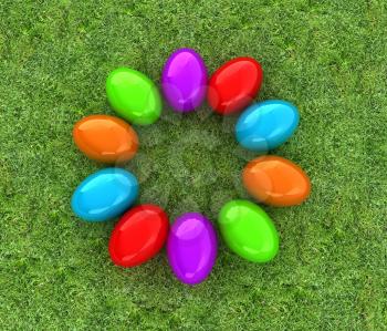 Colored Easter eggs as a flower on a green grass