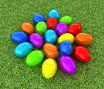 Colored Easter eggs on a green grass