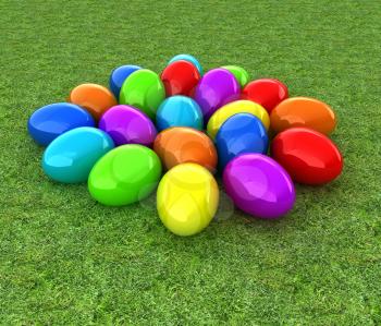 Colored Easter eggs on a green grass