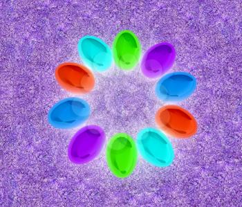 Colored Easter eggs as a flower on a green grass