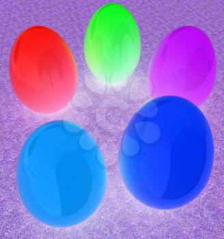 Colored Easter eggs on a green grass