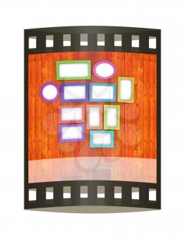 Mock up picture frames on wood wall. 3d illustration. The film strip