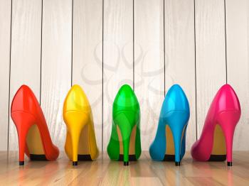 Shopping concept. Choice of colored high heels shoes on white wood background. 3d