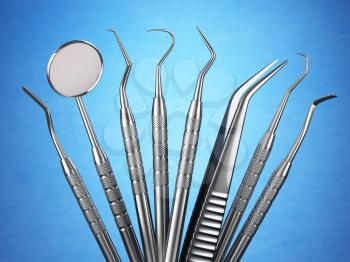 Dental tools set for teeth dental care ion blue background. Stomatology concept.. 3d illustration