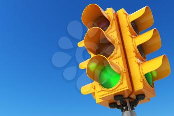 Traffic light with green color on blue sky background. 3d illustration