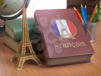 Learn and studiyng French concept. Book with  French flag and Eiffel tower on the table. 3d Iluustration