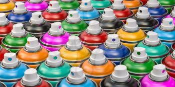 Rows of colorful graffity spray paint cans or bottles of aerosol. 3d illustration