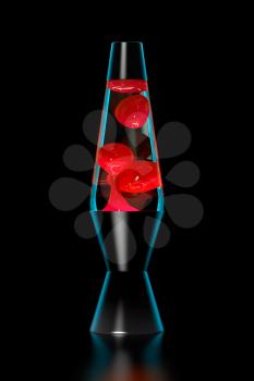 Lava lamp with red lava on black background Dark key.