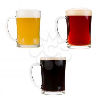 Realistic beer glasses isolated on white background. Mugs filled with red, dark and blond beer with bubbles and foam. Graphic design element for brewery ad, beer garden poster, flyers, printables.