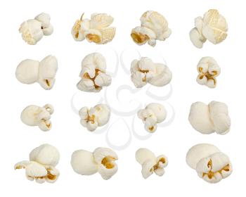 Scattered popcorn isolated on white background. Close up shot. High quality image. astfood popular during a movie in a cinema. Desogn element for advertisement, flyer, poster.