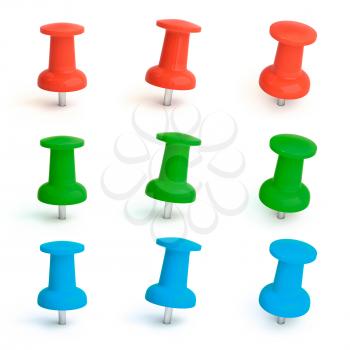 Colorful pins set in green, red and blue. Isolated on white.