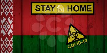 Flag of the Belarus in original proportions. Quarantine and isolation - Stay at home. flag with biohazard symbol and inscription COVID-19.