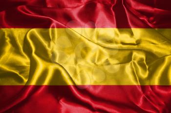 Spanish National Flag With Coat Of Arms Waving In The Wind 3D illustration