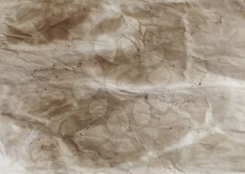 Grunge style paper background with stains and crumples