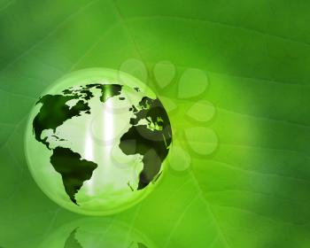 Eco background with a globe on a green leaf background