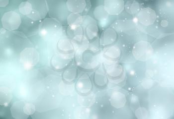 Glittery blue Christmas background with bokeh light effecy