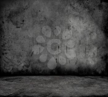 Grunge style image of a room interior with concrete wall and metal floor