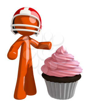 Football player orange man who has experienced a win standing beside a large party cupcake.