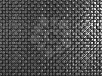 Royalty Free Clipart Image of Abstract Carbon Fiber With Pimples